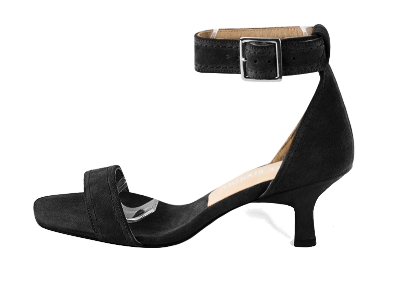 Matt black women's closed back sandals, with a strap around the ankle. Square toe. Medium spool heels. Profile view - Florence KOOIJMAN